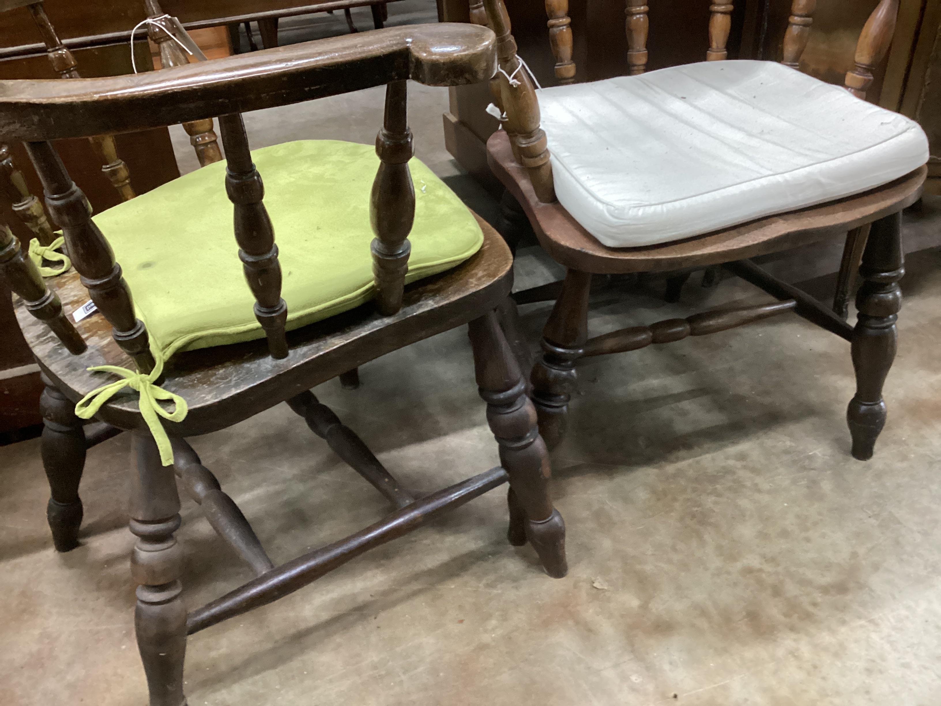 A near pair of late Victorian elm and beech Windsor smoker's bow chairs, width 69cm, depth 50cm, height 80cm